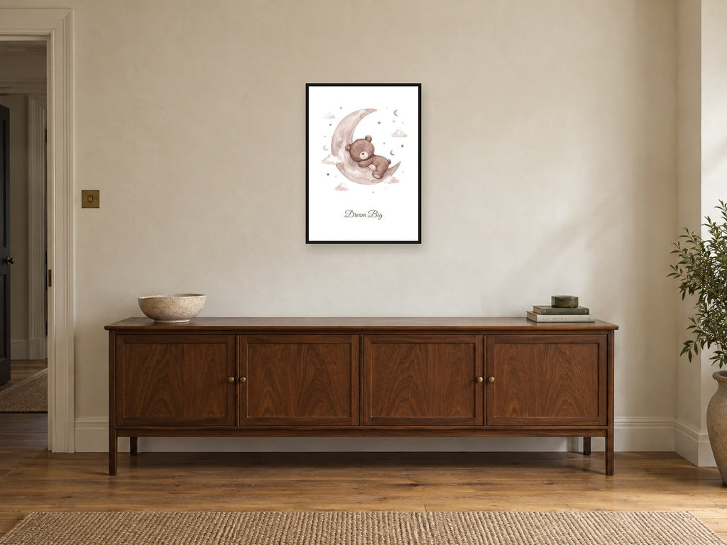 Dream Big — Teddy Sky Adventures Nursery Print at A2, in a black frame, above a sideboard