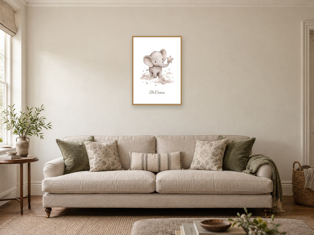 Be Curious — Elephant Little Wonders Nursery Print at A2, in a natural wood frame, in a sitting room