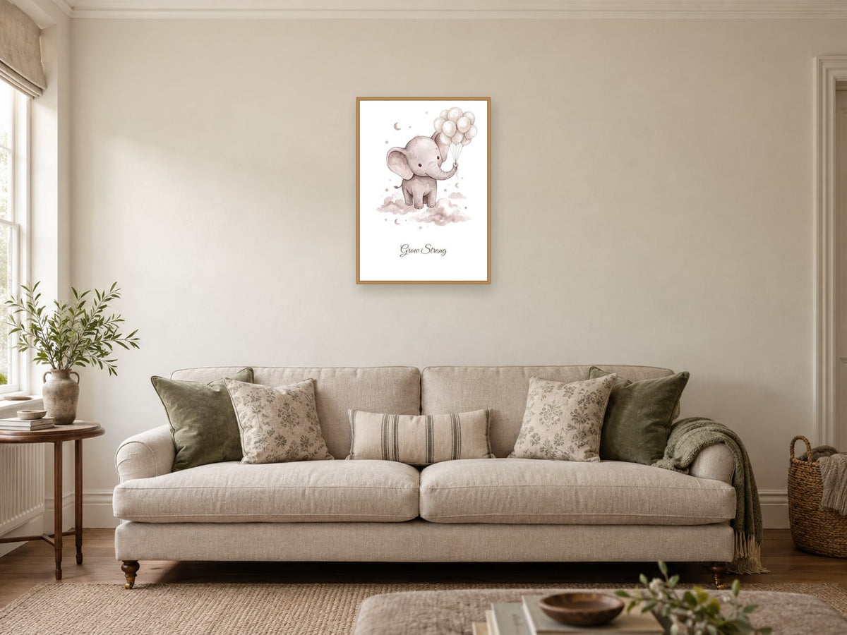 Grow Strong — Elephant Little Wonders Nursery Print at A2, in a natural wood frame, in a sitting room