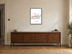 Shine Bright — Ocean Lullabies Nursery Print at A2, in a black frame, above a sideboard