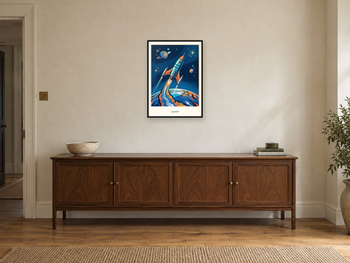 Launch — Cosmic Explorers Children’s Art Print at A2, in a black frame, above a sideboard