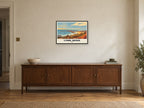 Lyme Regis — Retro Railway Art Print at A2, in a black frame, above a sideboard