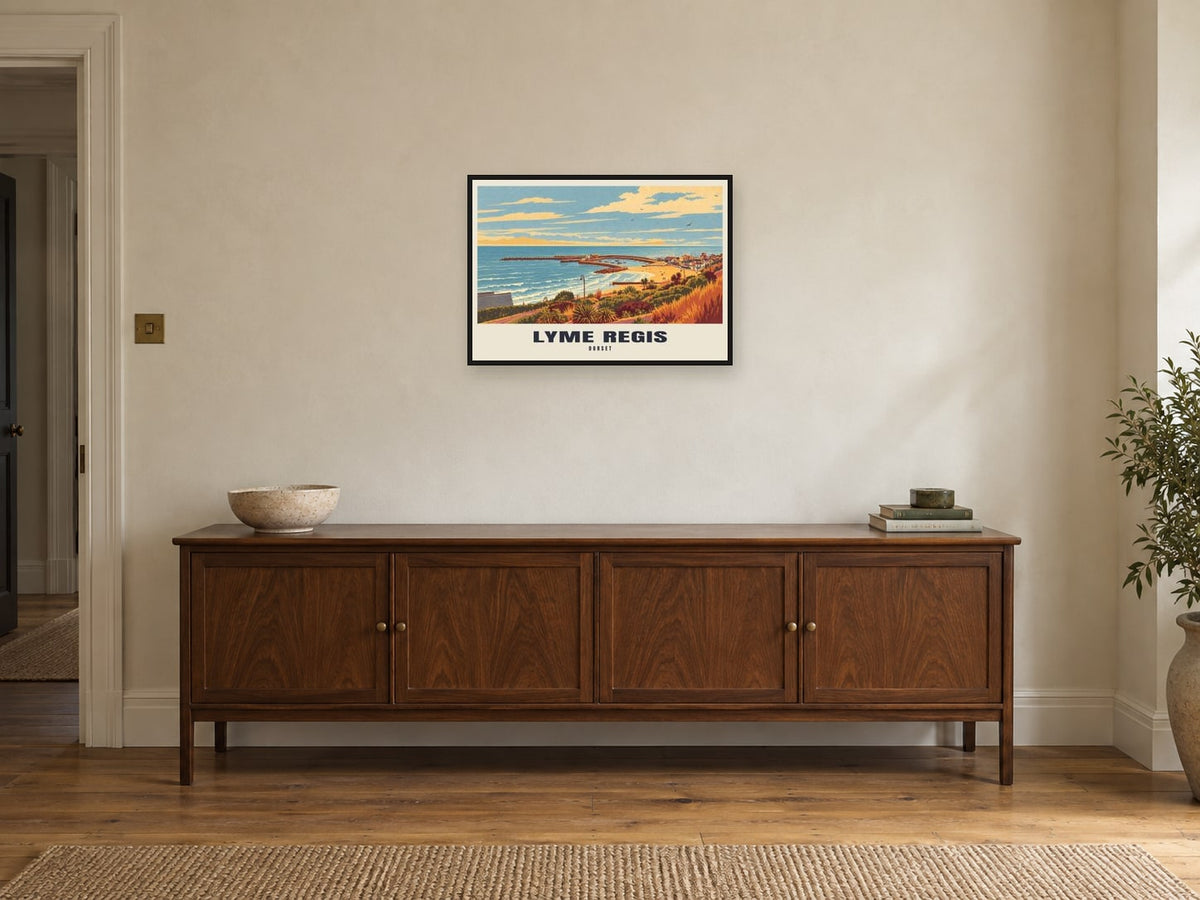 Lyme Regis — Retro Railway Art Print at A2, in a black frame, above a sideboard
