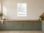 Barnstaple Town Centre Street Map Poster at A1, in a white frame, in a kitchen