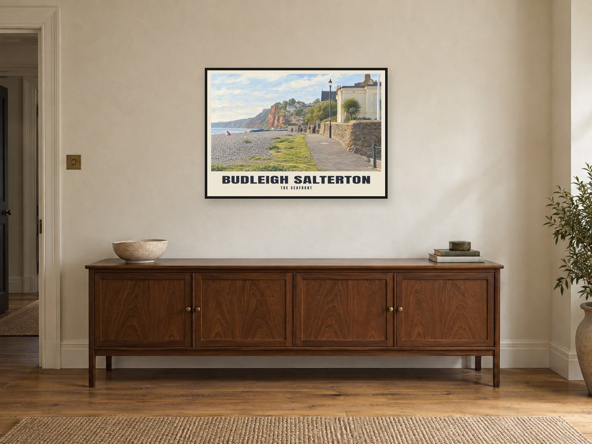 The Seafront, Budleigh Salterton Poster at A1, in a black frame, above a sideboard