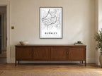 Burnley Town Centre Street Map Poster at A1, in a black frame, above a sideboard