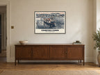 Campbeltown Harbour Poster at A1, in a black frame, above a sideboard