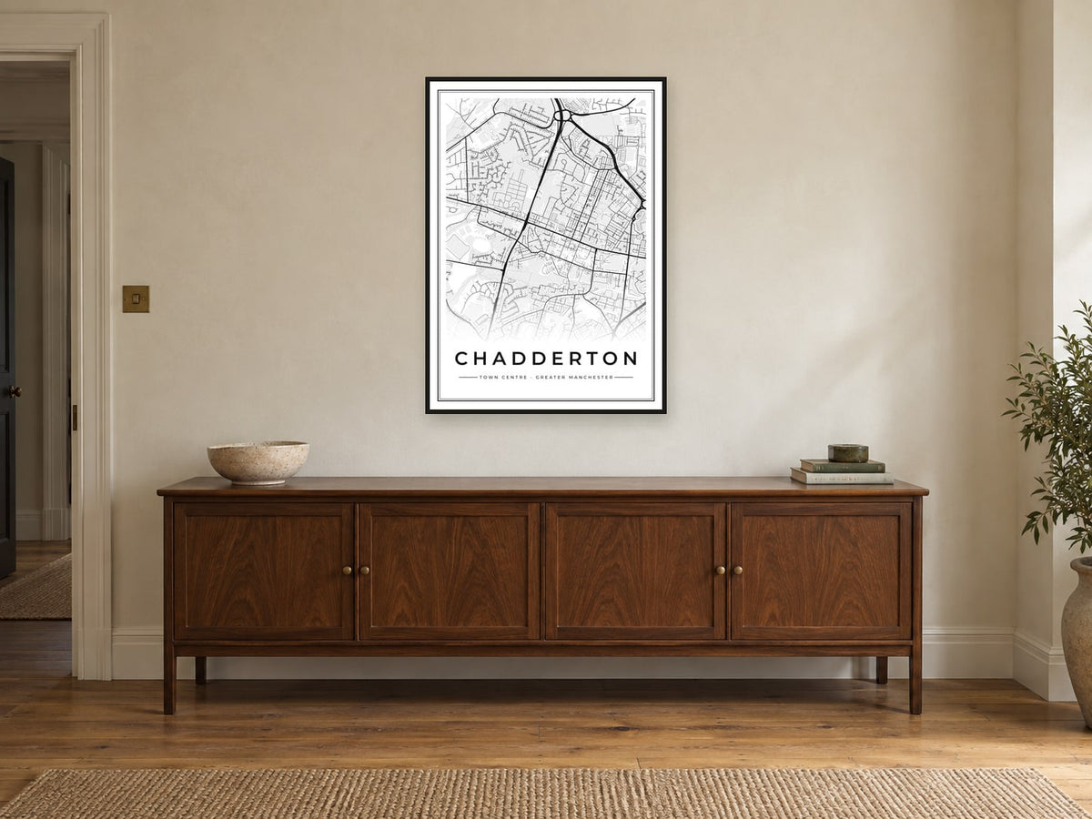 Chadderton Town Centre Street Map Poster at A1, in a black frame, above a sideboard