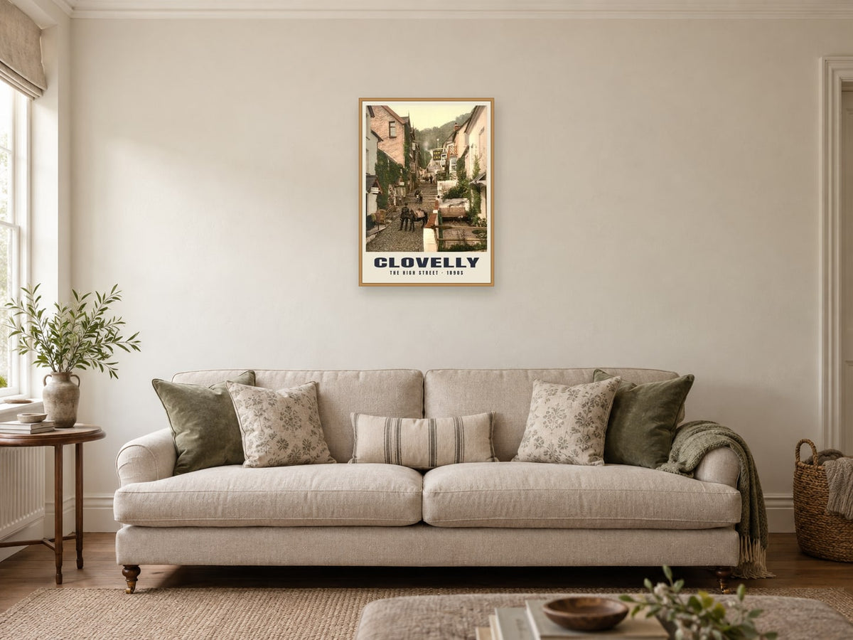 The High Street, Clovelly, 1890s Heritage Print at A2, in a natural wood frame, in a sitting room