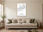 Colne Town Centre Street Map Poster at A1, in a natural wood frame, in a sitting room