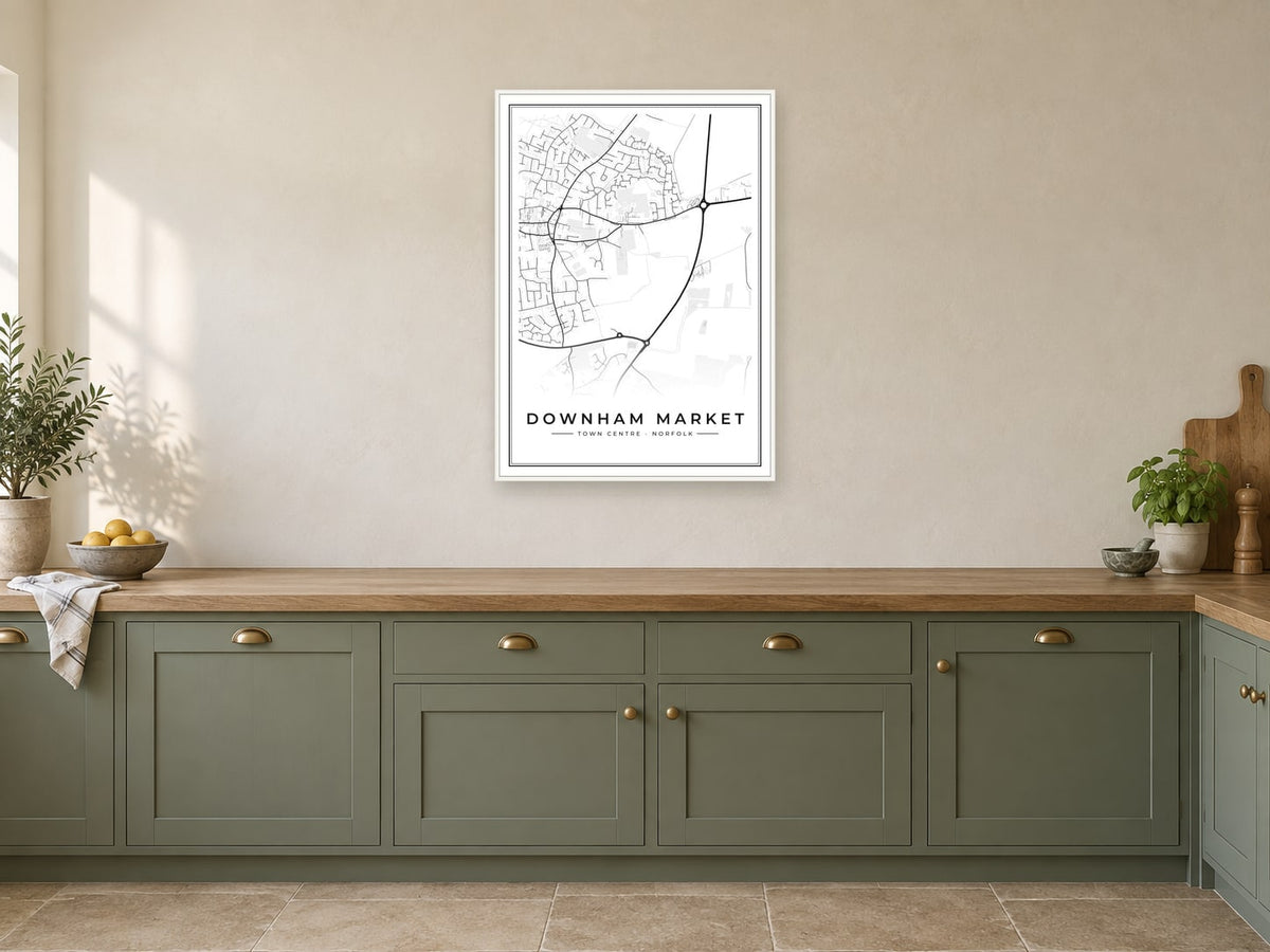 Downham Market Town Centre Street Map Poster at A1, in a white frame, in a kitchen
