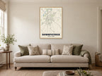 Downpatrick Street Map Poster at A1, in a natural wood frame, in a sitting room