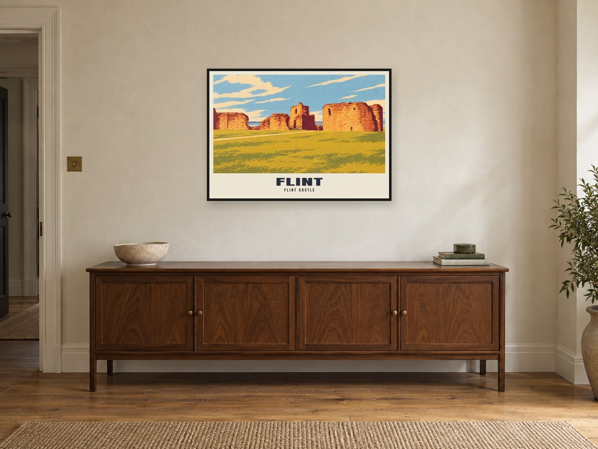 Flint Castle Poster at A1, in a black frame, above a sideboard