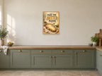 Pass the Butter Please — A2 artwork shown in a room with a natural wood frame; select a framed finish to include a frame