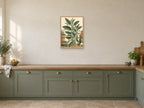 Sage Leaf Rhythm — A2 artwork shown in a room with a natural wood frame; select a framed finish to include a frame