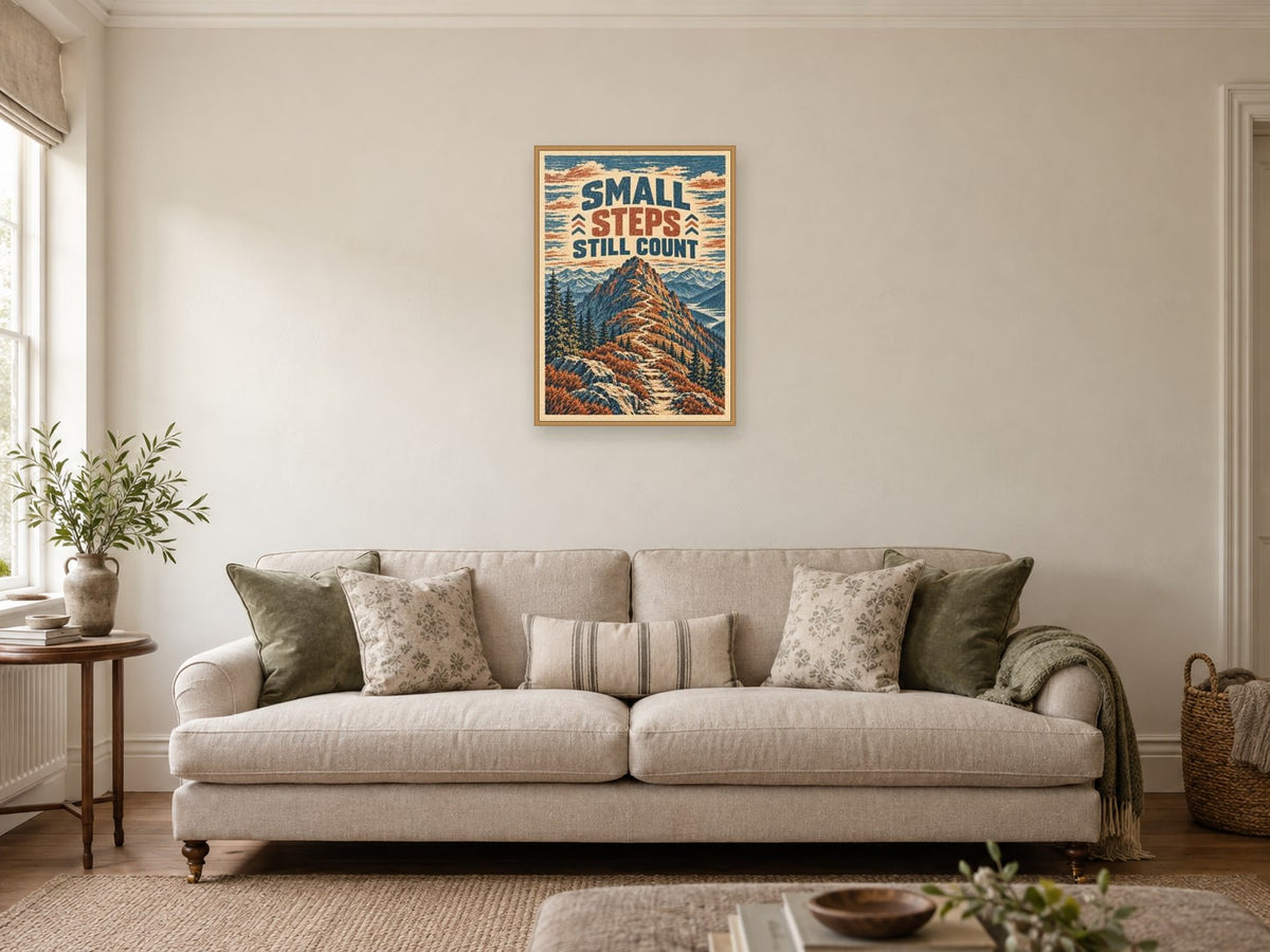 Small Steps Still Count — A2 artwork shown in a room with a natural wood frame; select a framed finish to include a frame