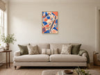 The Colour Test — A2 artwork shown in a room with a natural wood frame; select a framed finish to include a frame