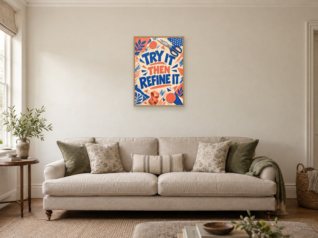 Try It Then Refine It — A2 artwork shown in a room with a natural wood frame; select a framed finish to include a frame