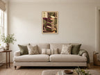 The Book Stack Lean — A2 artwork shown in a room with a natural wood frame; select a framed finish to include a frame