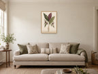 Monstera Silhouette Study — A2 artwork shown in a room with a natural wood frame; select a framed finish to include a frame