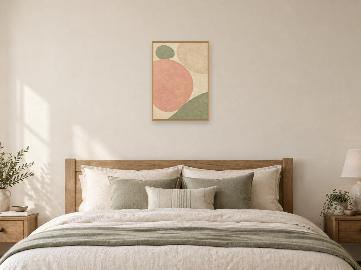 Two Stones in Balance — A2 artwork shown in a room with a natural wood frame; select a framed finish to include a frame