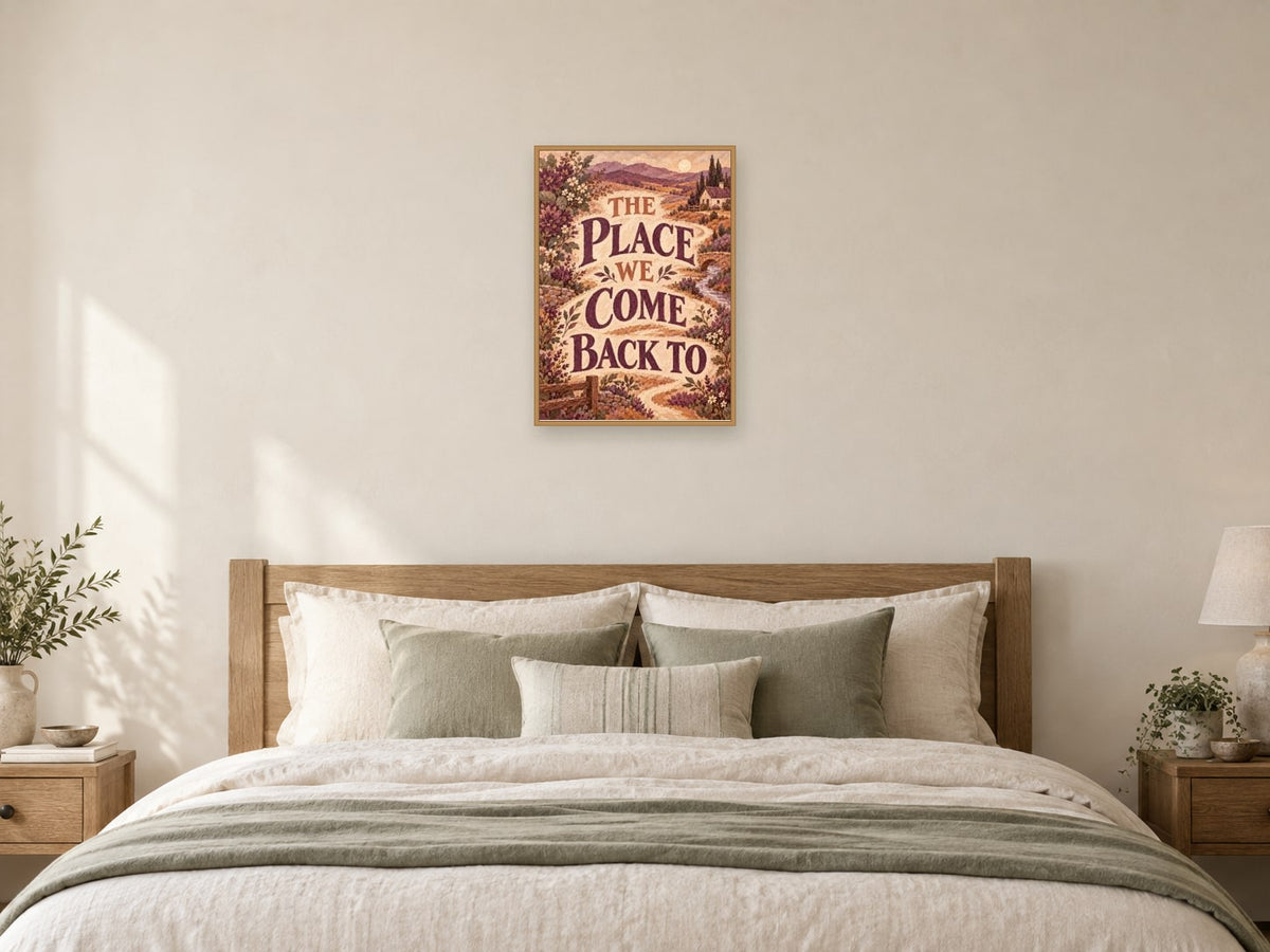The Place We Come Back To — A2 artwork shown in a room with a natural wood frame; select a framed finish to include a frame