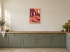 Two Glasses After Supper — A2 artwork shown in a room with a natural wood frame; select a framed finish to include a frame