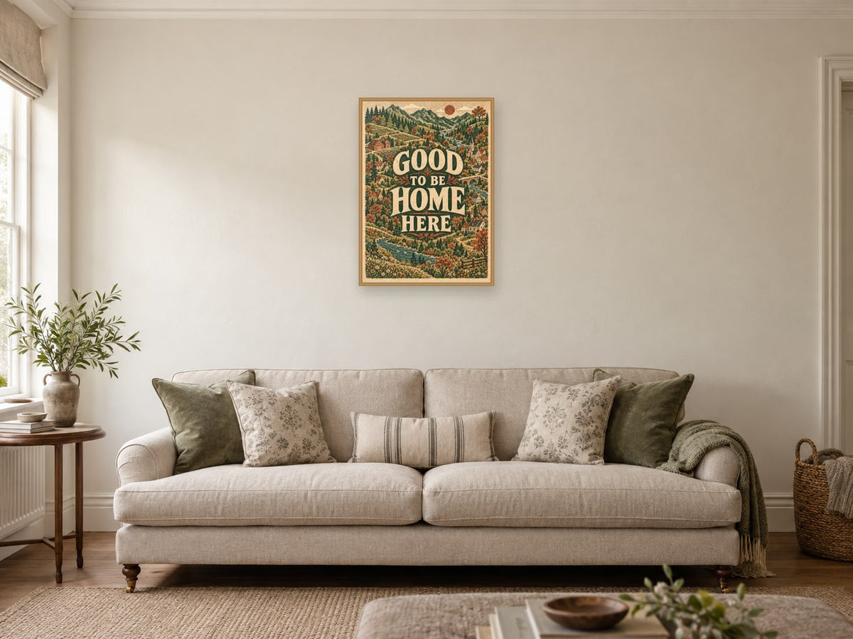 Good to Be Home Here — A2 artwork shown in a room with a natural wood frame; select a framed finish to include a frame