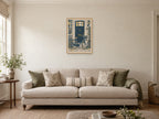 The Bicycle by the Door — A2 artwork shown in a room with a natural wood frame; select a framed finish to include a frame