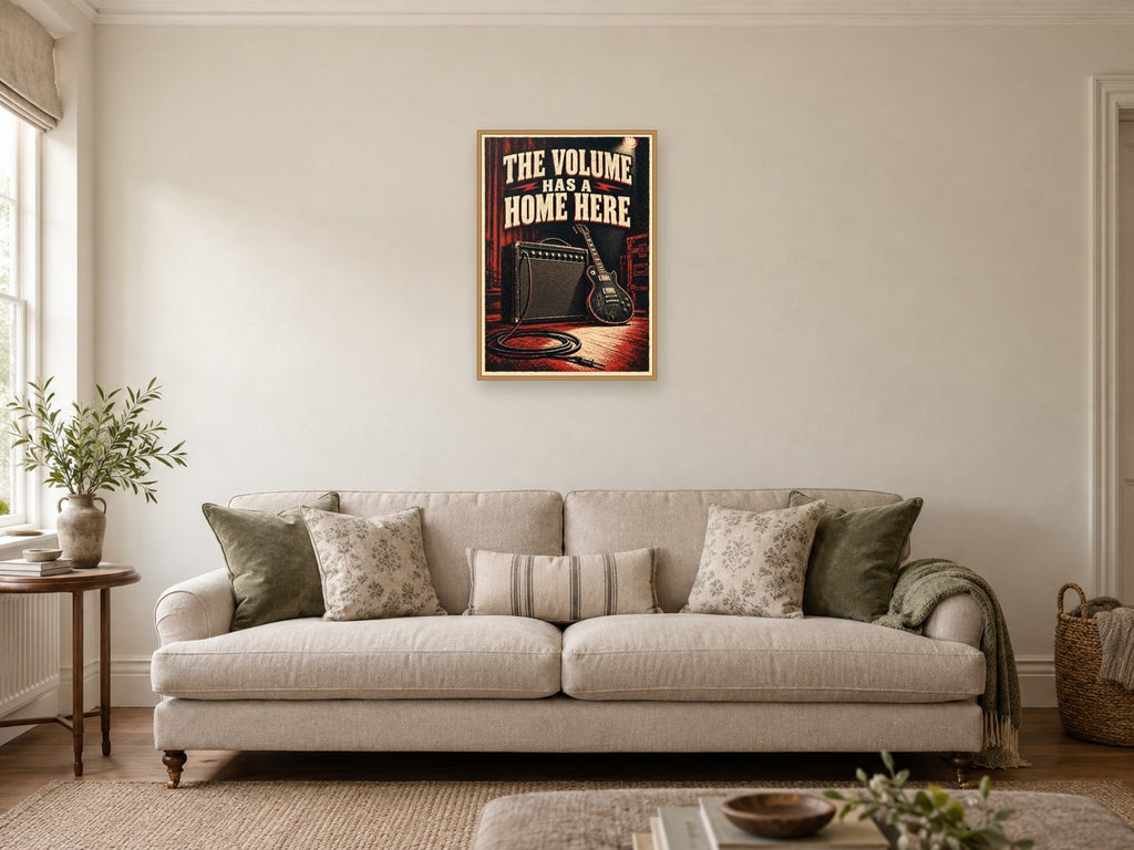 The Volume Has a Home Here — A2 artwork shown in a room with a natural wood frame; select a framed finish to include a frame