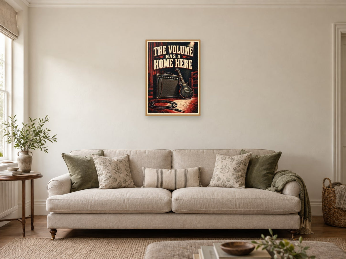 The Volume Has a Home Here — A2 artwork shown in a room with a natural wood frame; select a framed finish to include a frame
