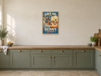 Save Me The Sunny Spot — A2 artwork shown in a room with a natural wood frame; select a framed finish to include a frame