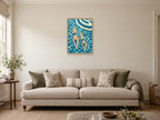 Two swimmers passing — A2 artwork shown in a room with a natural wood frame; select a framed finish to include a frame