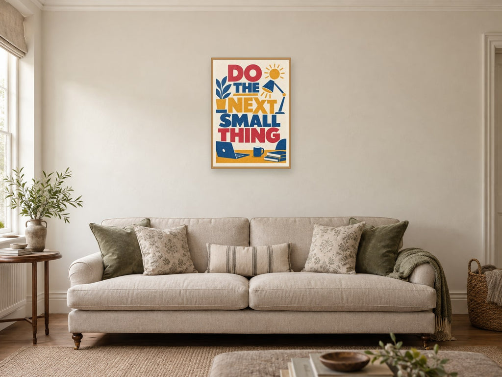 Do The Next Small Thing — A2 artwork shown in a room with a natural wood frame; select a framed finish to include a frame
