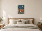 fox curled among soft meadow grasses — A2 artwork shown in a room with a natural wood frame; select a framed finish to include a frame