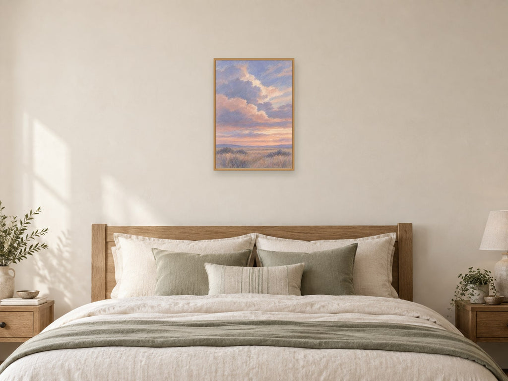 Broad dusk clouds over an imaginary quiet field — A2 artwork shown in a room with a natural wood frame; select a framed finish to include a frame