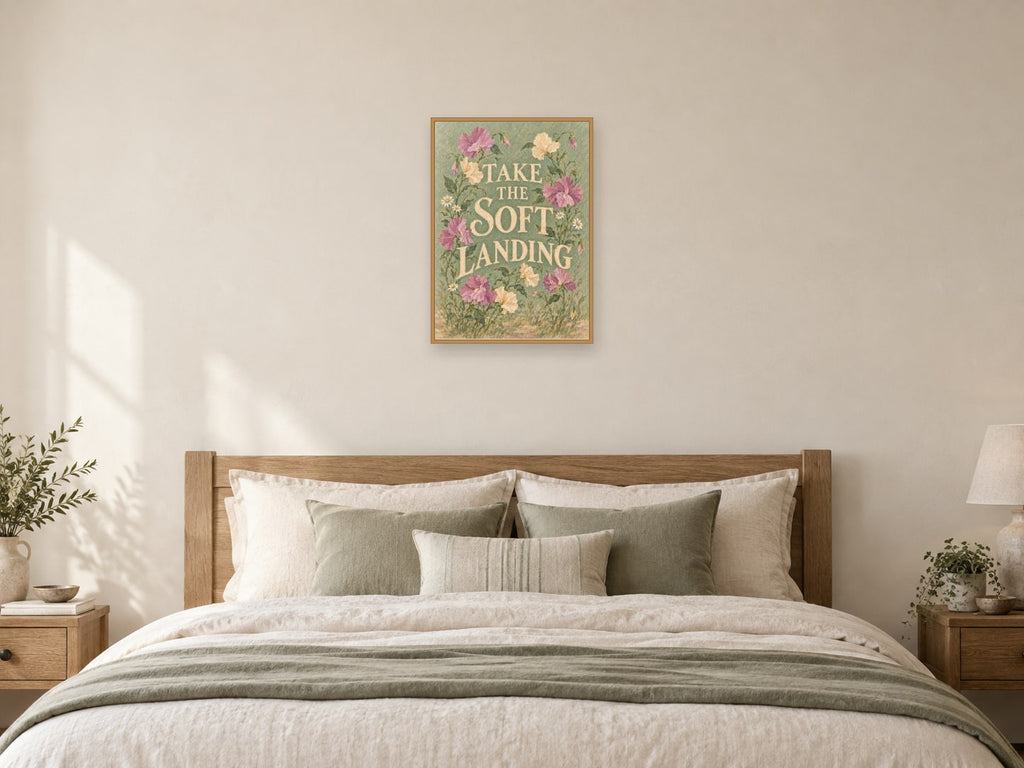Take The Soft Landing — A2 artwork shown in a room with a natural wood frame; select a framed finish to include a frame