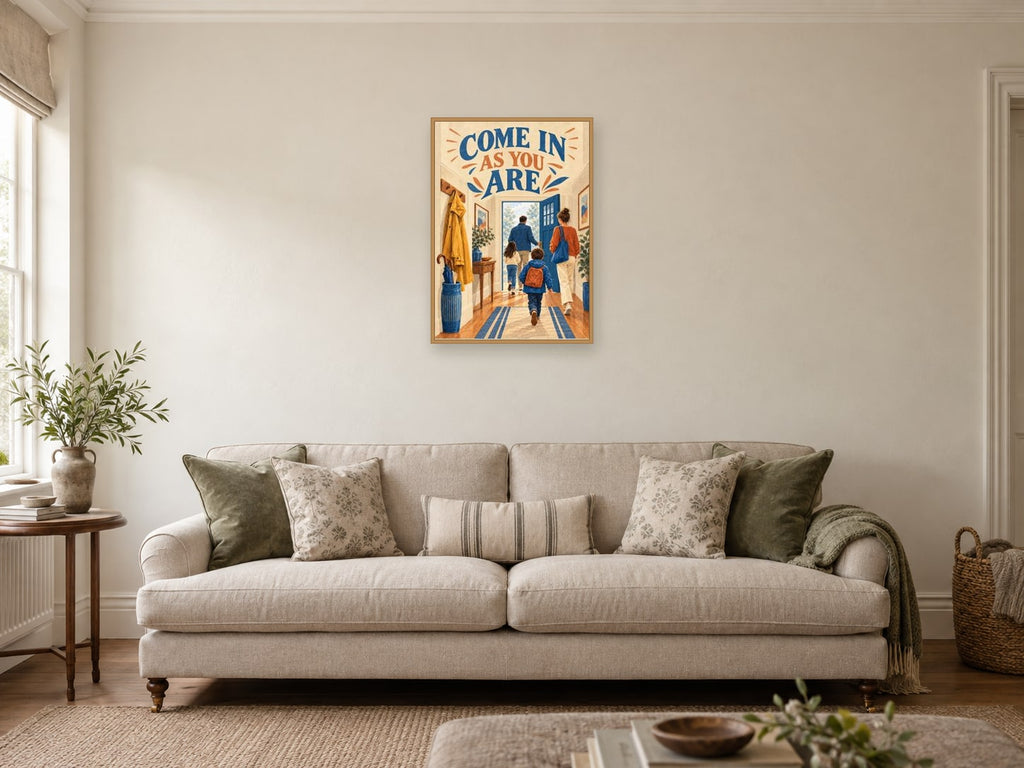Come In As You Are — A2 artwork shown in a room with a natural wood frame; select a framed finish to include a frame