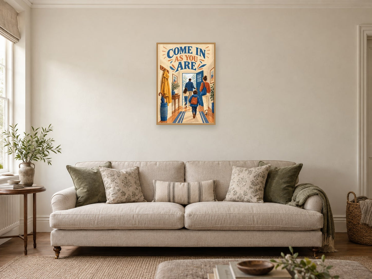 Come In As You Are — A2 artwork shown in a room with a natural wood frame; select a framed finish to include a frame