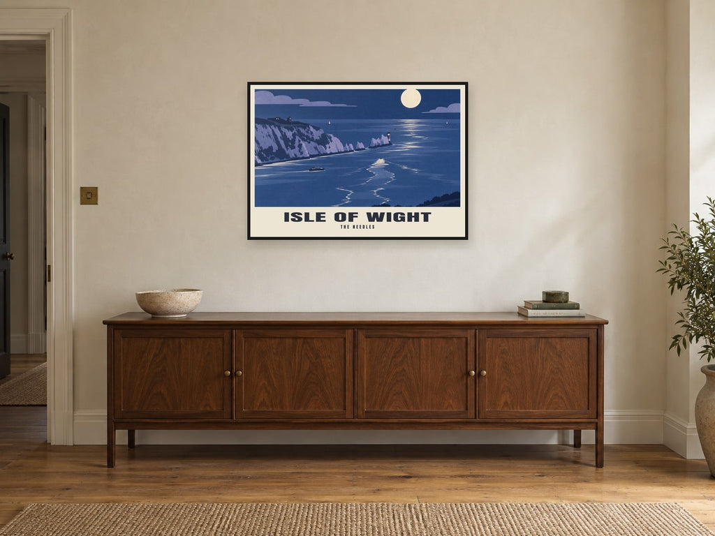 The Needles, Isle of Wight Poster at A1, in a black frame, above a sideboard