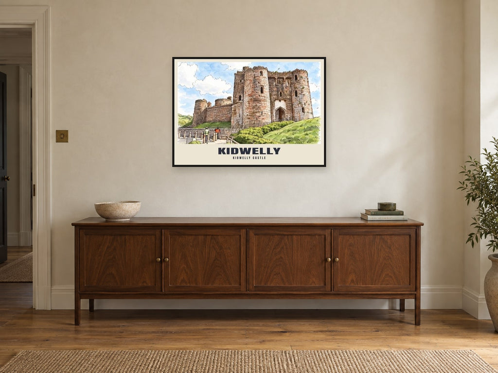 Kidwelly Castle Poster at A1, in a black frame, above a sideboard