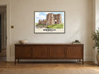 Kidwelly Castle Poster at A1, in a black frame, above a sideboard