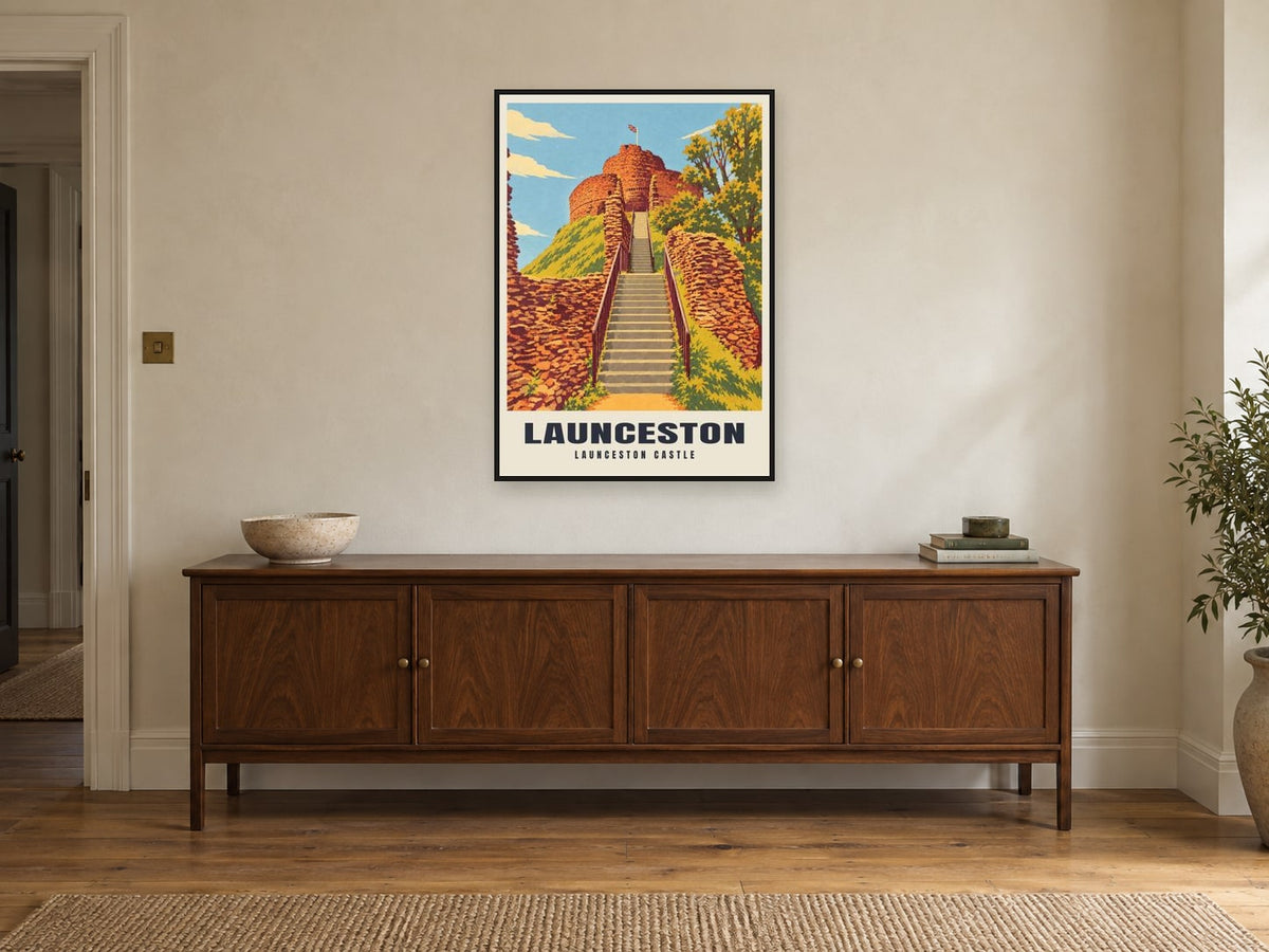 Launceston Castle Poster at A1, in a black frame, above a sideboard
