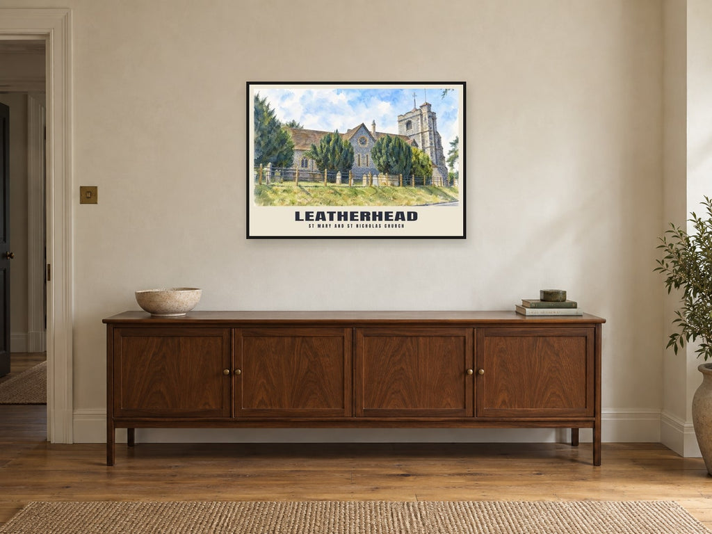 St Mary and St Nicholas Church, Leatherhead Poster at A1, in a black frame, above a sideboard