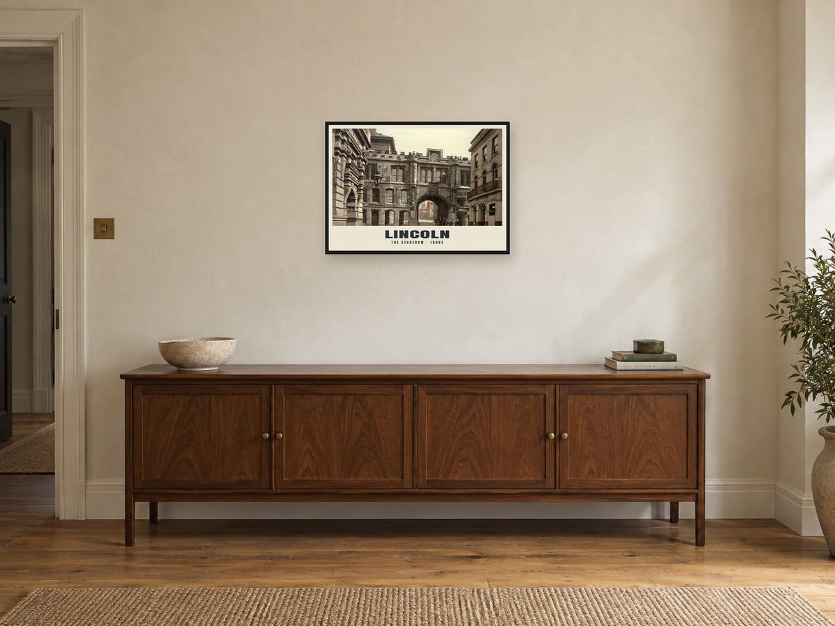 The Stonebow, Lincoln, 1890s Heritage Print at A2, in a black frame, above a sideboard