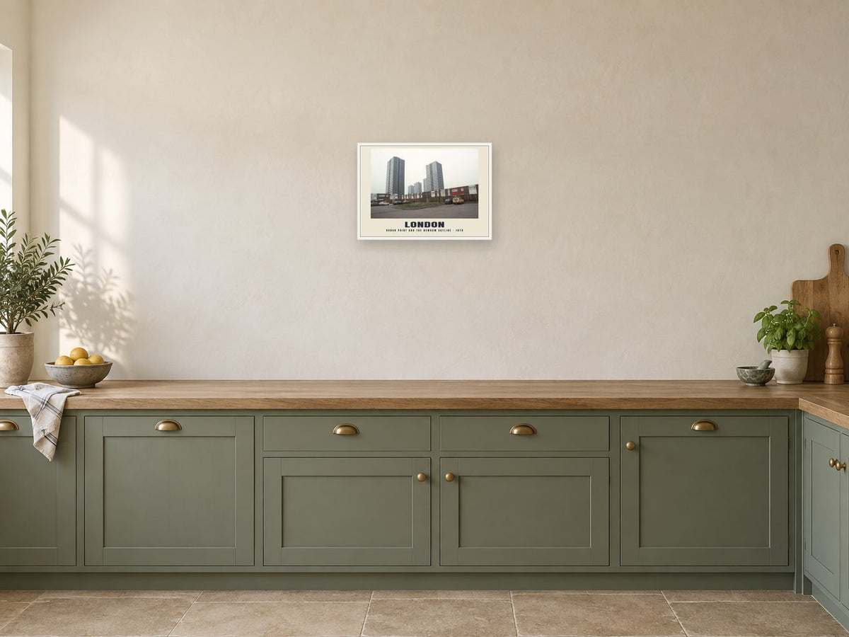 Ronan Point and the Newham skyline, London, 1979 Heritage Print at A3, in a white frame, in a kitchen