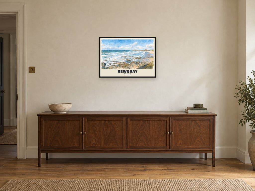 Newquay named English Watercolour print at A2, in a black frame, above a sideboard