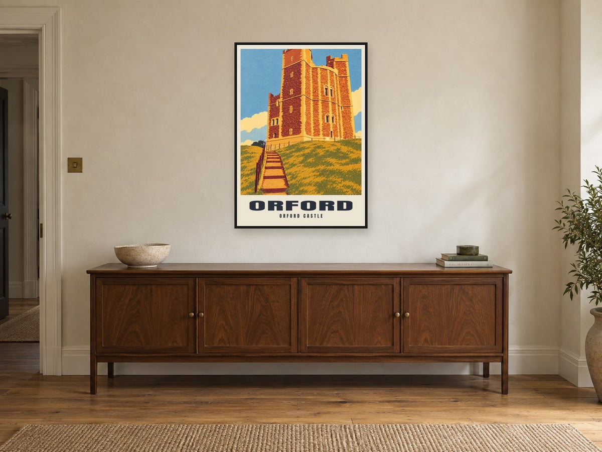 Orford Castle Poster at A1, in a black frame, above a sideboard