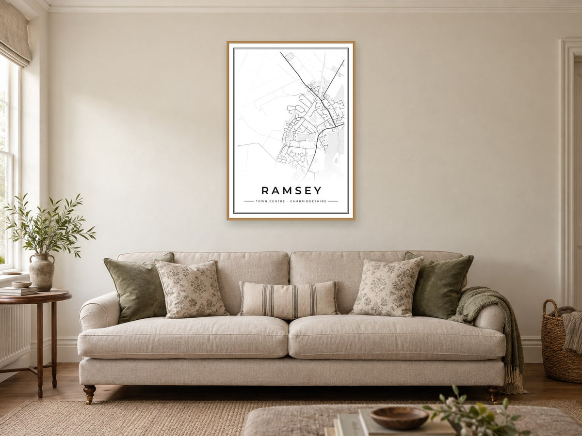 Ramsey Town Centre Street Map Poster at A1, in a natural wood frame, in a sitting room