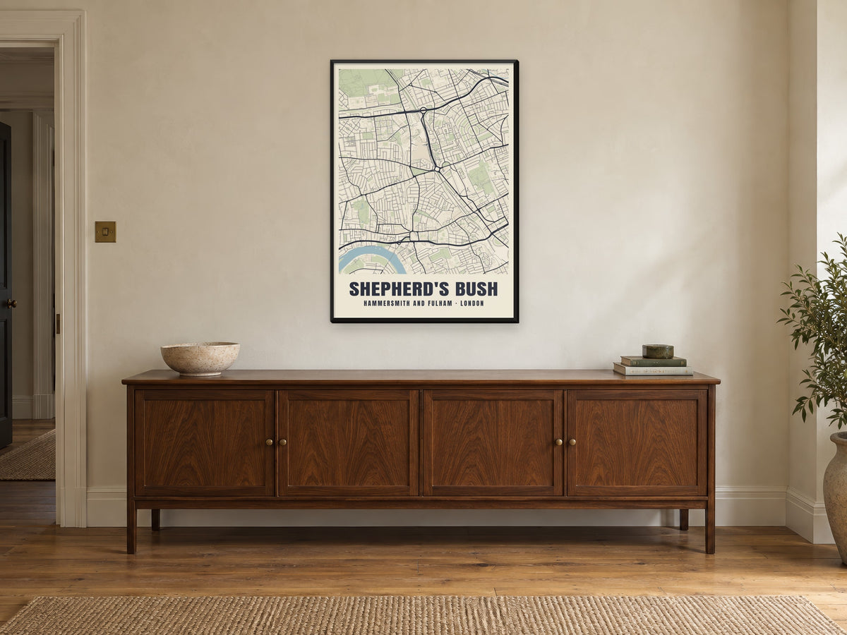 Shepherd's Bush Heritage Street Map Poster at A1, in a black frame, above a sideboard